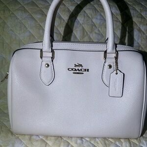 Cream white coach handbag, has been used but has been kept in to great condition